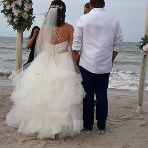 Price includes veil, hair piece, hair pins.